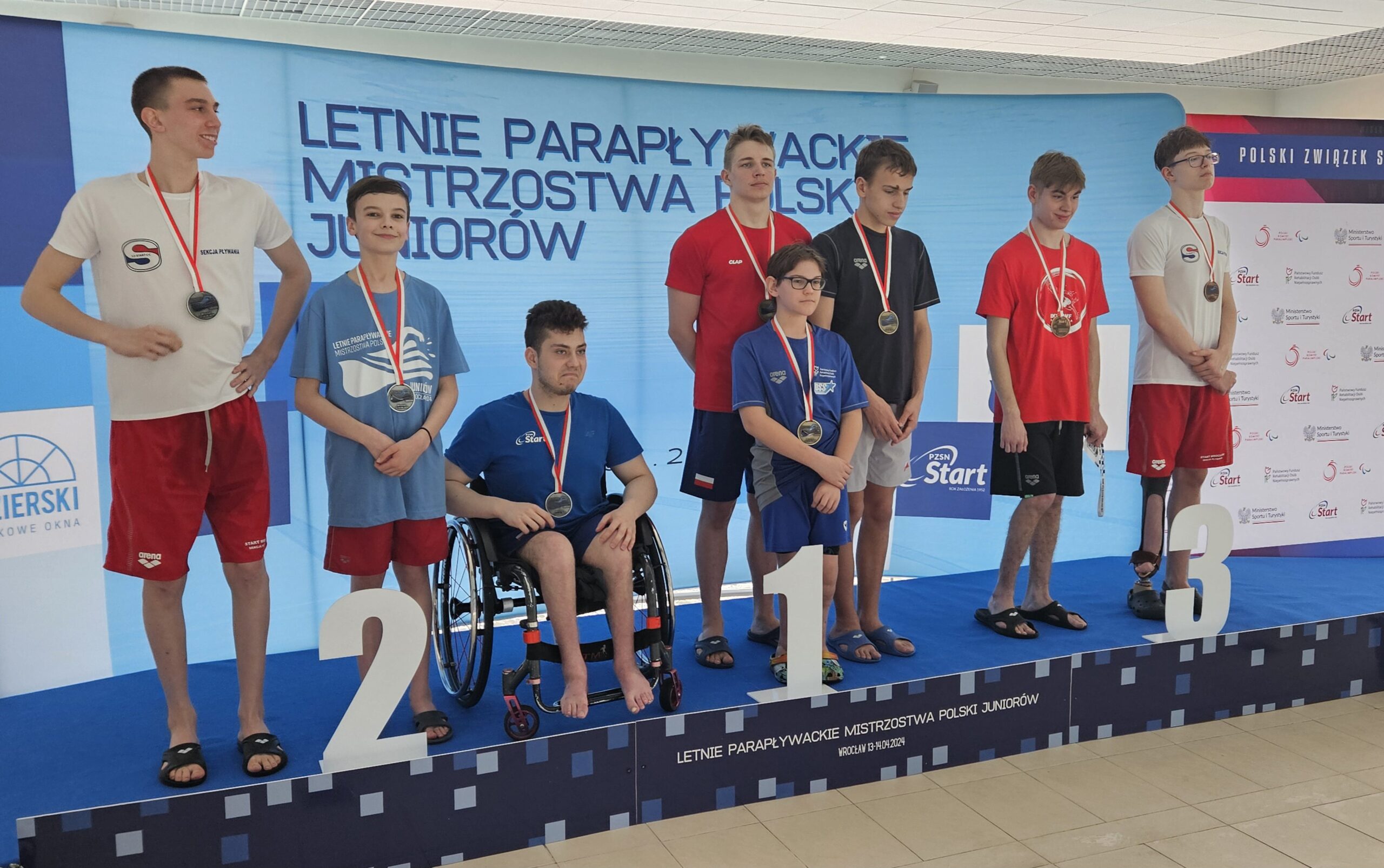 Alex na podium zawodów.