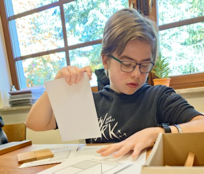 Bartek wybiera ćwiczenie z geometrii.