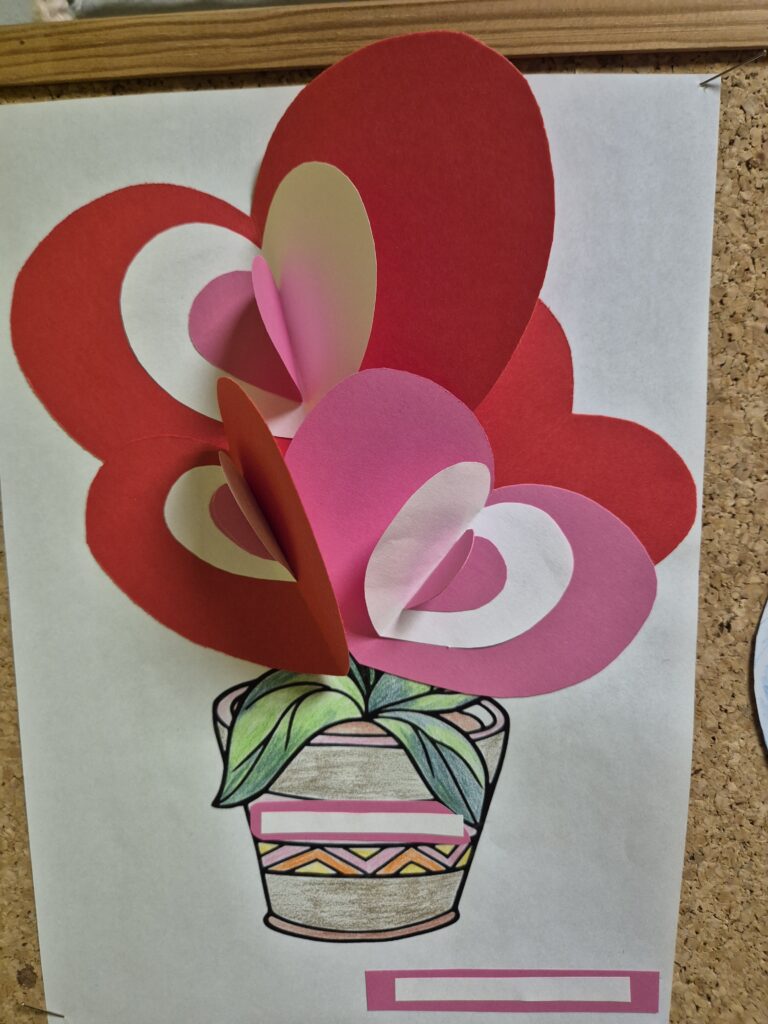 Kwiatek z serc w doniczce jako kartk a walentynkowa